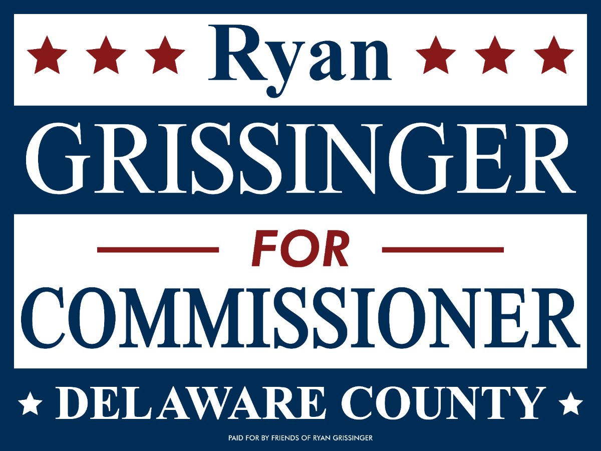 The yard signs are here